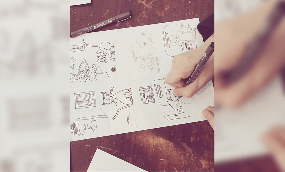 Photo d'une planche de manga en cours de réalisation - Agrandir l'image, fenêtre modale